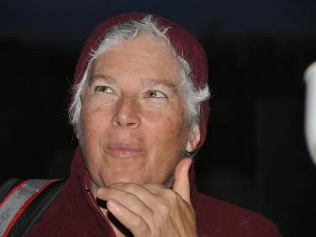 Exploring the Multifaceted Appeal of the Red Essentials Hoodie: A Pivotal Piece for Every Wardrobe