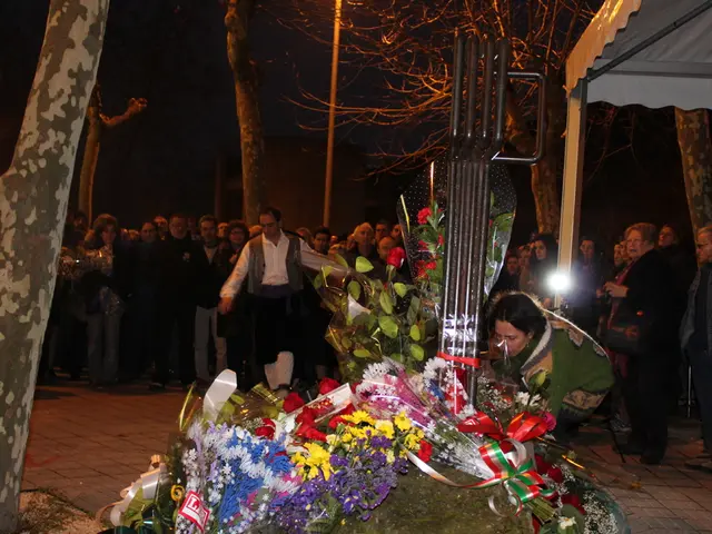 Autumnal gathering of seniors within a bell tent on a sloping hillside